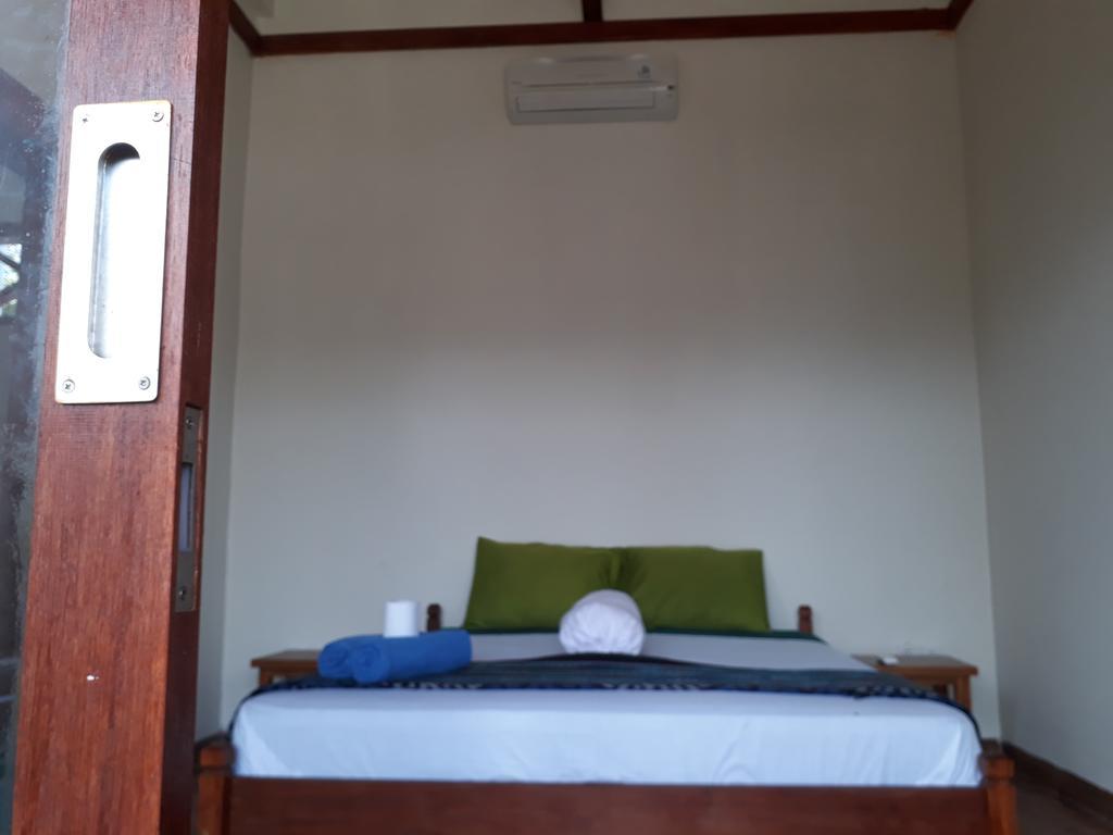 Kuta Bay Homestay Bilik gambar